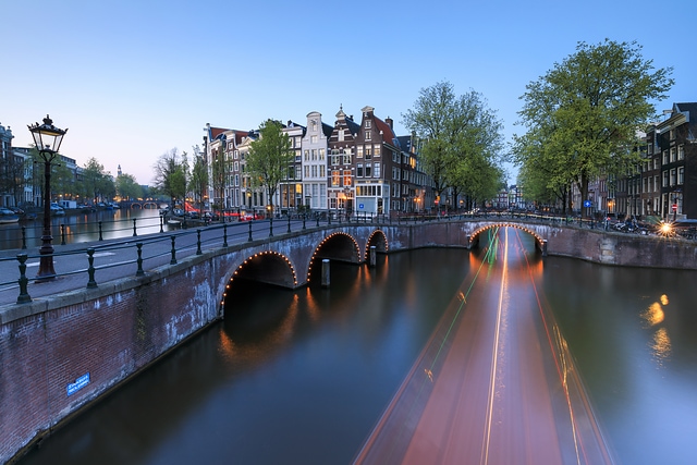 Dusk on the canal Amsterdam Holland